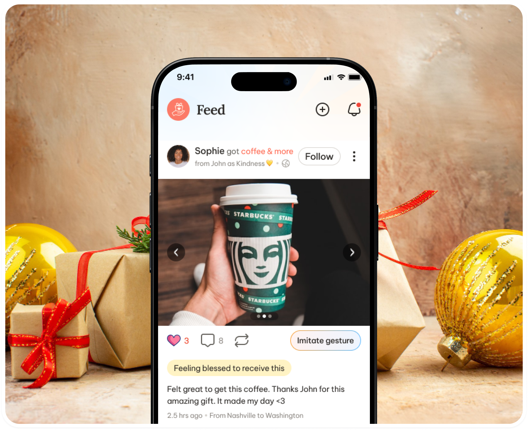The TOOM feed on a phone, held in front of wrapped presents